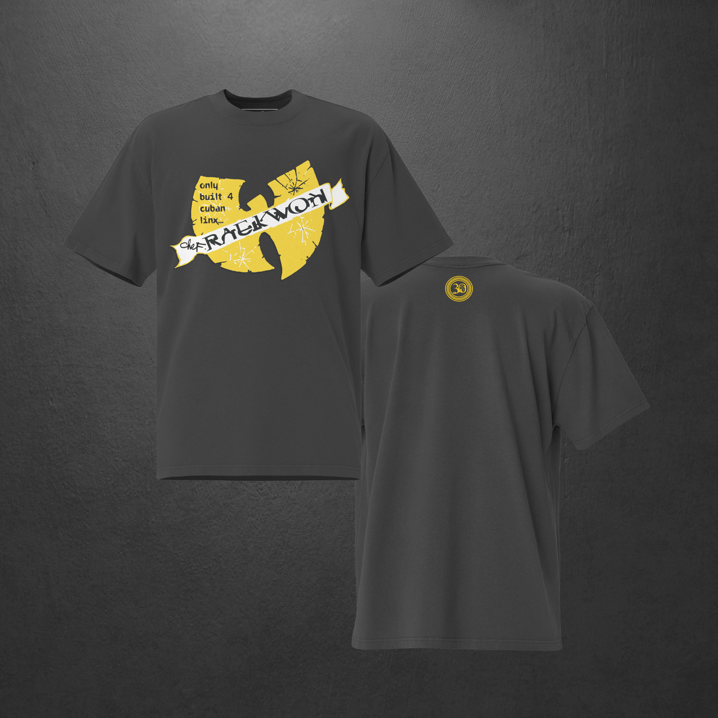Black t-shirt with yellow graphic design on a dark gray background